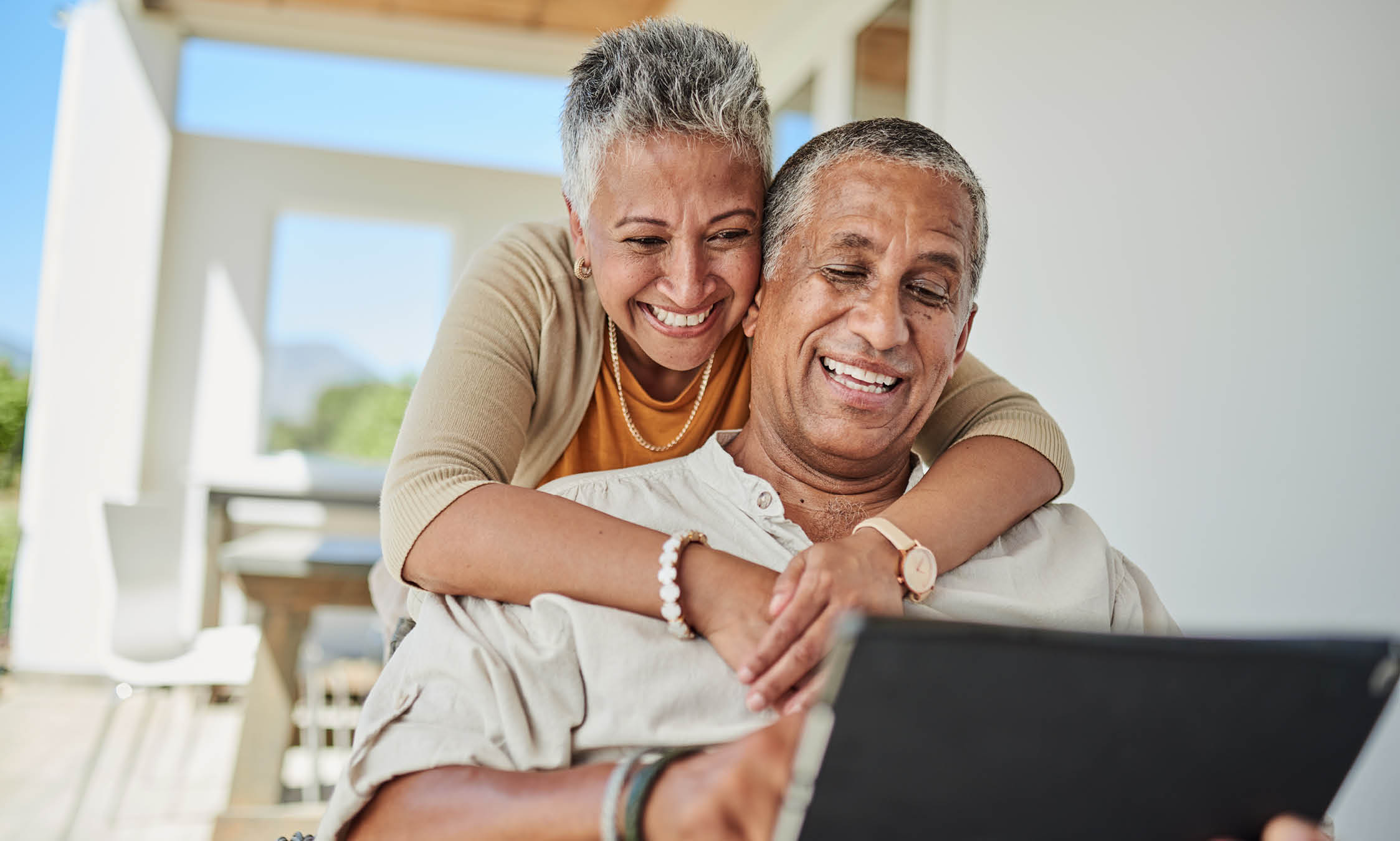 Tablet, retirement and senior couple on outdoor patio reading website for online quote, wealth and asset management research. Elderly, senior people happy with digital app life insurance information