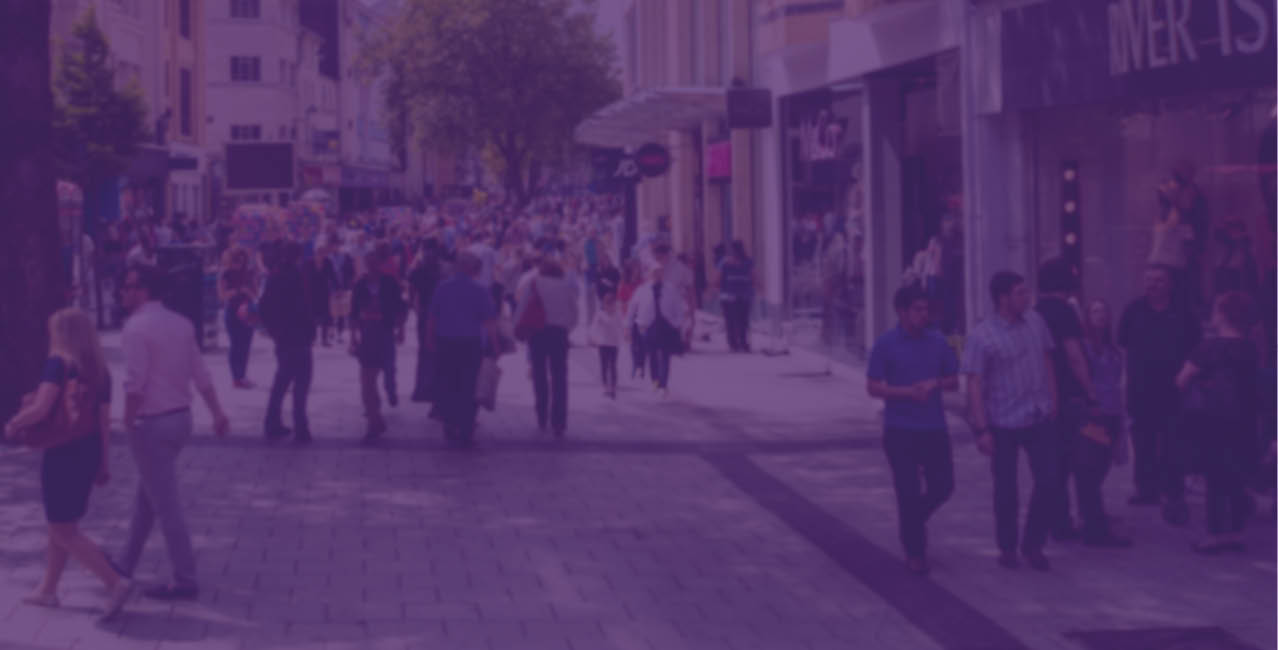 Queen Street, one of Cardiff's main shopping streets, busy with Saturday shoppers.