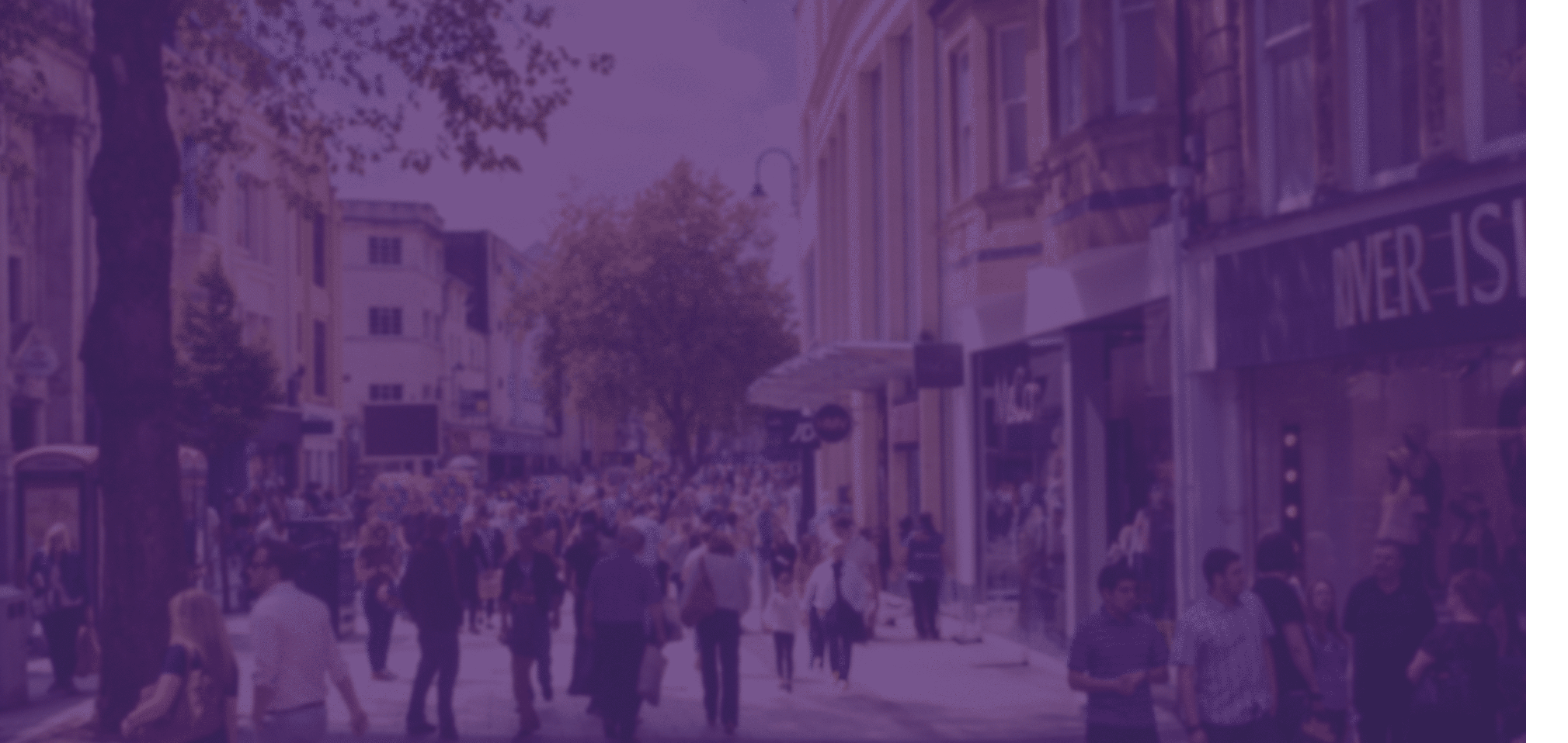 Queen Street, one of Cardiff's main shopping streets, busy with Saturday shoppers.